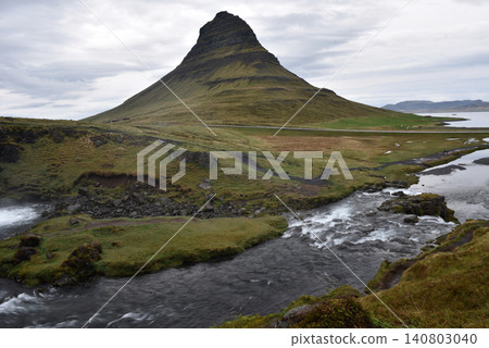 River flowing below Kirkjufell mountain in the Snaefellsnes Peninsula, Iceland River flowing below Kirkjufell mountain in the Snaefellsnes Peninsula, Iceland 140803040