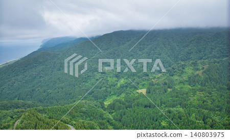 Mountain scenery in Sasagawa district, Asahi town, Toyama Prefecture during the rainy season. Mountain scenery in Sasagawa district, Asahi town, Toyama Prefecture during the rainy season. 140803975