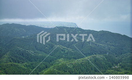 A view of the Kurobe River alluvial fan and Toyama Bay from the Sasagawa district of Asahi Town, Toyama Prefecture, during the rainy season. 140803998