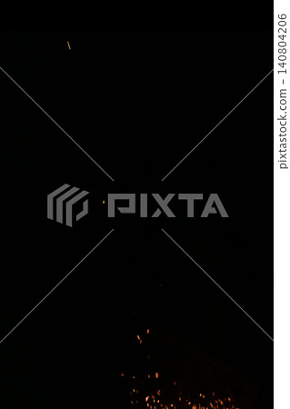 Shallow focus of fire sparks over black background 140804206