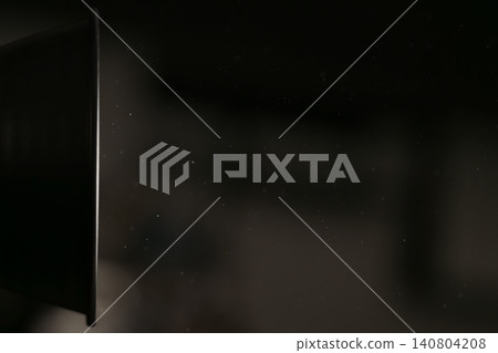 real dust particles floating in room with harsh light from light fixture real dust particles floating in room with harsh light from light fixture 140804208