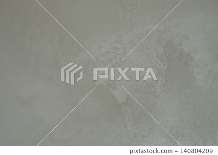 Closeup photo of decorative plaster wall surface Closeup photo of decorative plaster wall surface 140804209