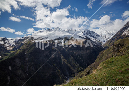 Snow covered mountains under blue sky Snow covered mountains under blue sky 140804901