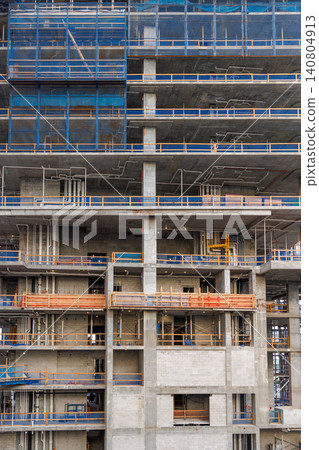 Skyscraper construction with visible engineering systems Skyscraper construction with visible engineering systems 140804913