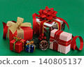Lots of gift boxes for Christmas presents, December gifts with red and gold ribbons. 140805137