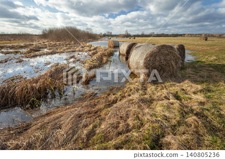 Hay Bales in Flooded Meadow Hay Bales in Flooded Meadow 140805236
