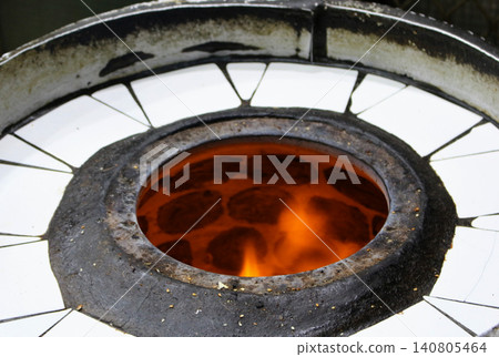 A blazing oven for baking rice cakes A blazing oven for baking rice cakes 140805464