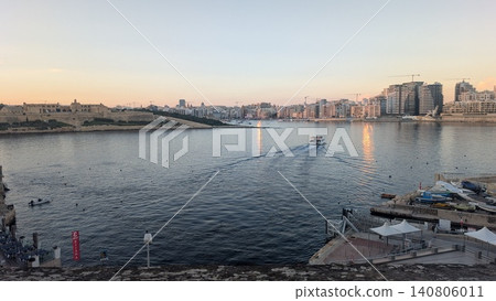 Panoramic view of the port of Valletta in the evening Panoramic view of the port of Valletta in the evening 140806011