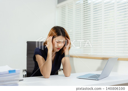 Serious businesswoman concentrating on his paper work at the table at office. Serious businesswoman concentrating on his paper work at the table at office. 140806100