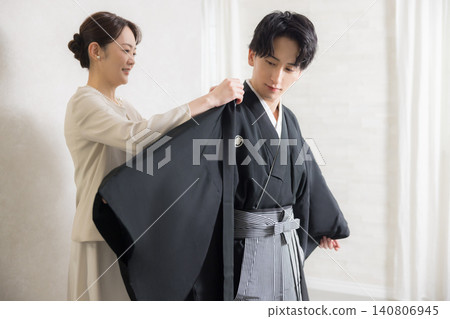 A young man in a hakama with family crest A young man in a hakama with family crest 140806945