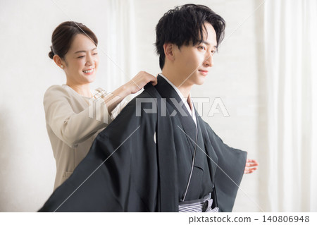 A young man in a hakama with family crest A young man in a hakama with family crest 140806948
