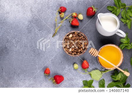 Healthy breakfast ingredients on stone background with copy space 140807140