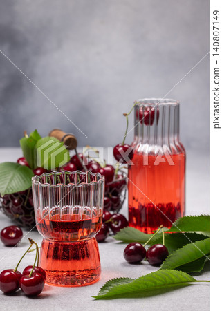 Fresh cherry juice drink and ripe berries Fresh cherry juice drink and ripe berries 140807149