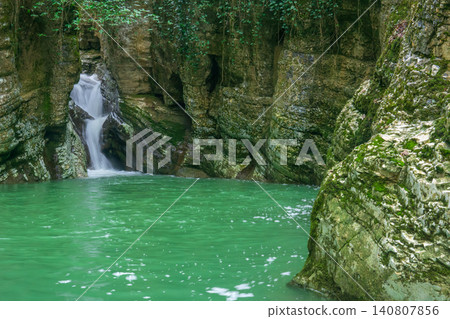 Waterfall and lake in canyon in tropical forest Waterfall and lake in canyon in tropical forest 140807856