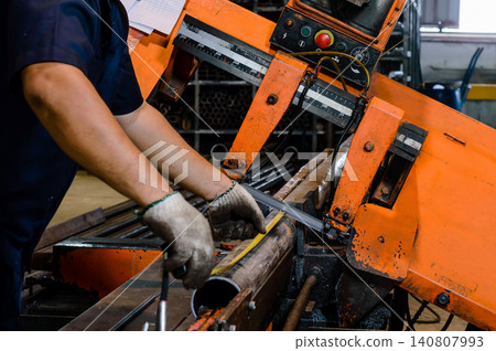 working with cutting machine working with cutting machine 140807993