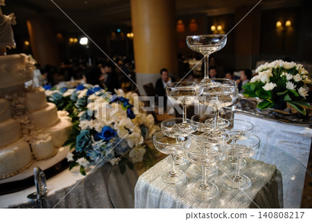 small tower of champagne's glass in wedding reception party small tower of champagne's glass in wedding reception party 140808217