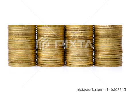 old & used golden coins stack up in white background 140808245