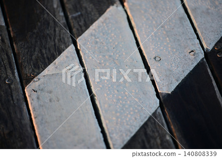 The deck is dripping with morning dew. The deck is dripping with morning dew. 140808339