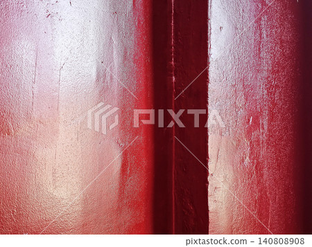 Vibrant Red Painted Wall Corner with Distinct Bumpy Texture, Modern Interior Abstract Surface Background for Graphic Design and Creative Projects. Vibrant Red Painted Wall Corner with Distinct Bumpy Texture, Modern Interior Abstract Surface Background for Graphic Design and Creative Projects. 140808908