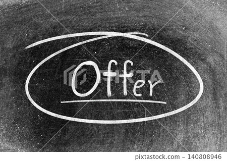 White chalk hand writing in word offer and circle shape on blackboard background White chalk hand writing in word offer and circle shape on blackboard background 140808946