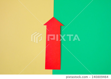 Red arrow pointing on color background. 140809464