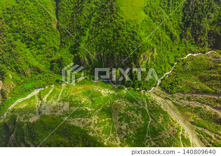 Mountain landscape in Kyrgyzstan with lush greenery Mountain landscape in Kyrgyzstan with lush greenery 140809640