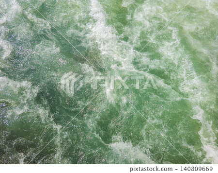 Turbulent Green Water Surface with White Foam Turbulent Green Water Surface with White Foam 140809669