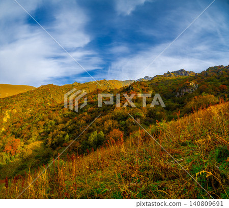 Autumn Mountain Slope with Vibrant Foliage in Kyrgyzstan Autumn Mountain Slope with Vibrant Foliage in Kyrgyzstan 140809691