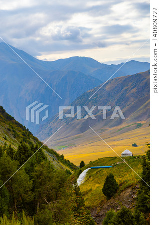 Scenic Mountain Valley in Kyrgyzstan with Yurt and Stream Scenic Mountain Valley in Kyrgyzstan with Yurt and Stream 140809722