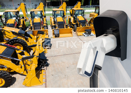 Electric construction machines with charging station. Concept. Electric construction machines with charging station. Concept. 140810145