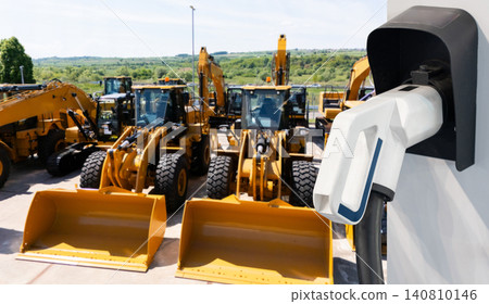 Electric construction machines with charging station. Concept. Electric construction machines with charging station. Concept. 140810146
