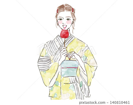Summer: A woman in a yukata eating a candy apple Summer: A woman in a yukata eating a candy apple 140810461