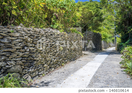 Coral stone wall in Yoro settlement Coral stone wall in Yoro settlement 140810614