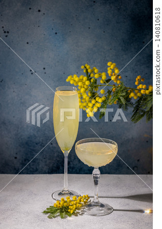 Mimosa cocktails with garnish celebrating spring season 140810618