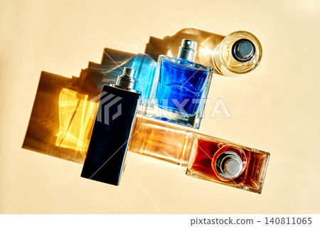 Fragrance layering perfume wardrobe with colored bottles Fragrance layering perfume wardrobe with colored bottles 140811065