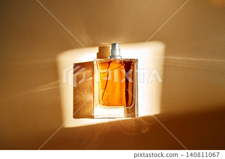 Biotech perfume bottle in warm natural light Biotech perfume bottle in warm natural light 140811067