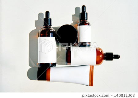 Cosmetic bottles with blank labels offering glp 1 skin support Cosmetic bottles with blank labels offering glp 1 skin support 140811308