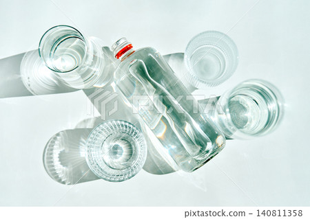 Clean water bottle and glasses for hydration Clean water bottle and glasses for hydration 140811358