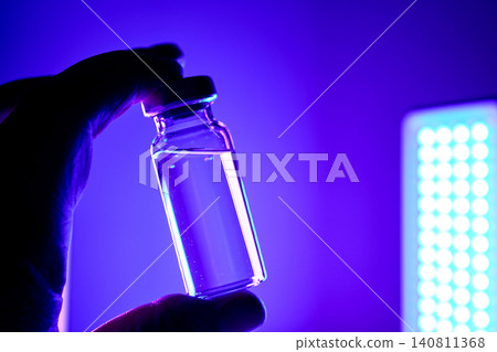 Hand holding innovative glp 1 peptide medication vial developing anti obesity drug Hand holding innovative glp 1 peptide medication vial developing anti obesity drug 140811368