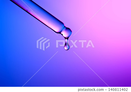 Pipette dropping cosmetic serum for microbiome skincare innovation 140811402
