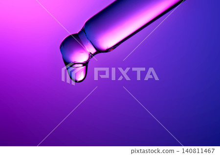 Peptide based serum drop preparing to fall from pipette Peptide based serum drop preparing to fall from pipette 140811467
