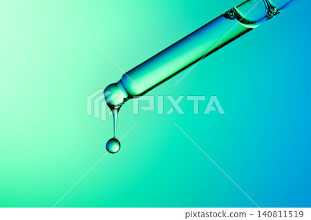 Regenerative beauty serum dripping from a skincare dropper Regenerative beauty serum dripping from a skincare dropper 140811519