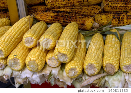 Close-up of roasted and fresh corn cobs Istanbul street food. Close-up of roasted and fresh corn cobs Istanbul street food. 140811583
