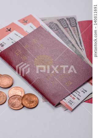 Japanese passport or id document with tickets for flight, travel, border crossing. Japan passport Japanese passport or id document with tickets for flight, travel, border crossing. Japan passport 140811691