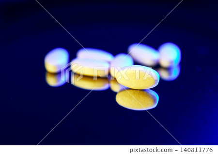Glp 1 peptide based metabolic therapy pills on dark surface Glp 1 peptide based metabolic therapy pills on dark surface 140811776