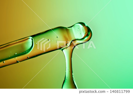 Peptide based skincare serum dripping from pipette Peptide based skincare serum dripping from pipette 140811799