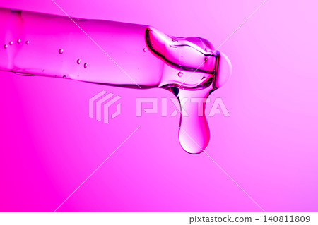 Peptide serum dropping from pipette for advanced skincare Peptide serum dropping from pipette for advanced skincare 140811809