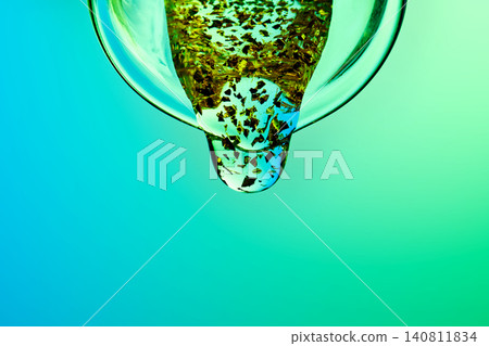 Premium serum dropping with gold flakes for longevity skincare Premium serum dropping with gold flakes for longevity skincare 140811834