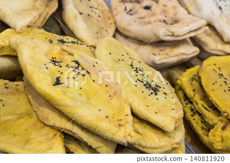 Aromatic flatbread bolani with vegetables. Traditional Afghan cuisine Aromatic flatbread bolani with vegetables. Traditional Afghan cuisine 140811920