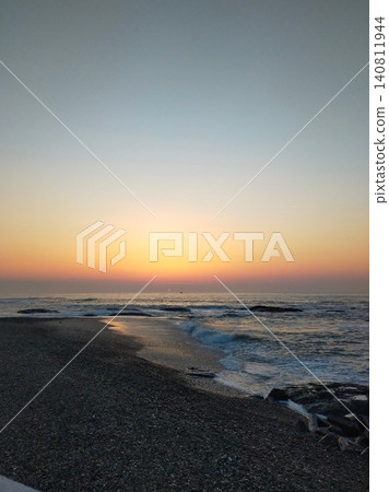 A beautiful sunrise scene on the coast, with stunning gradients of colors in the magic hour. A beautiful sunrise scene on the coast, with stunning gradients of colors in the magic hour. 140811944